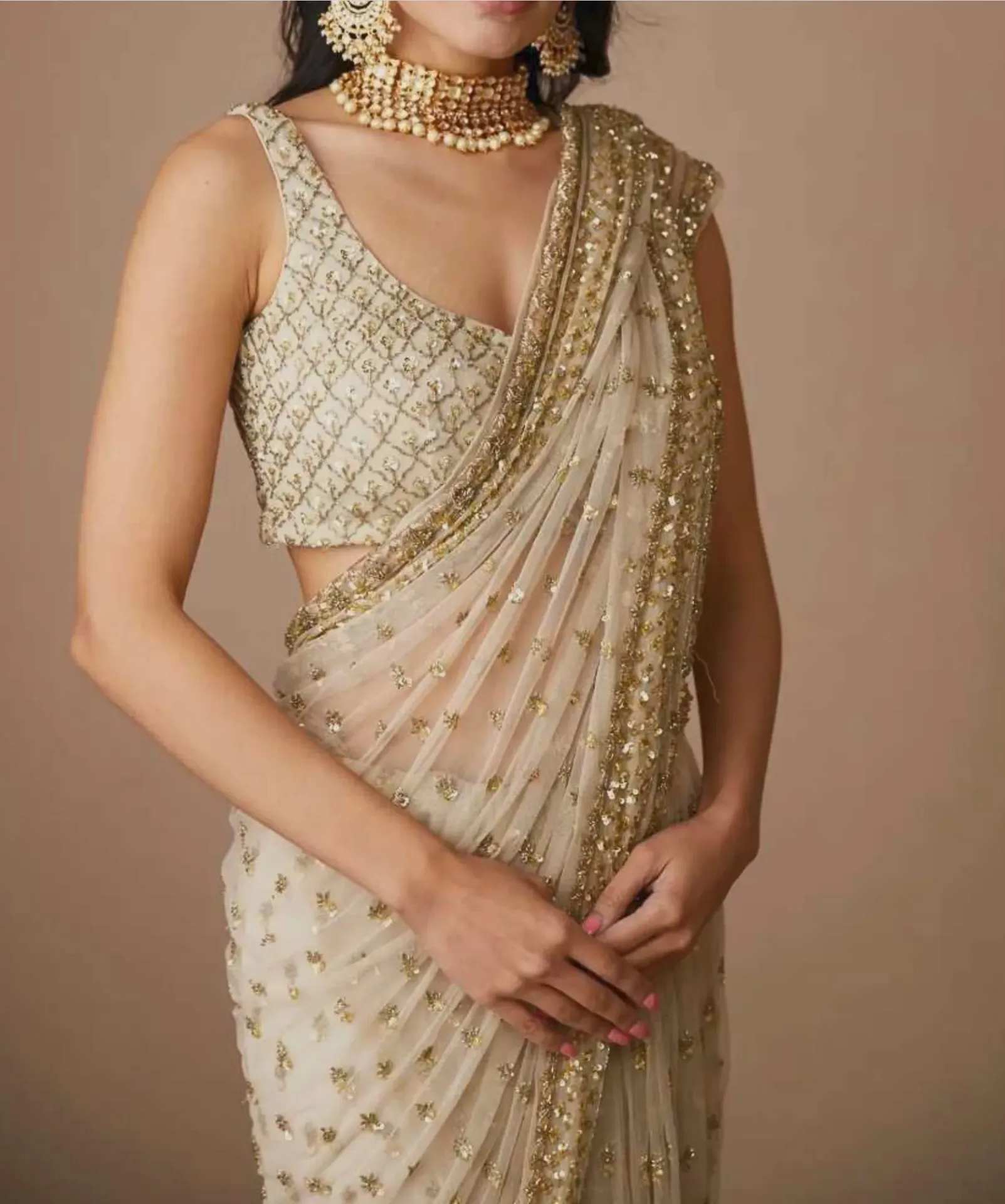Zari Seq Cream Saree